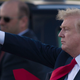 President Donald Trump “waves” to supporters after arriving at his Mar-a-Lago resort on April 18, 2019